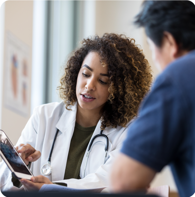 patient and doctor using tablet